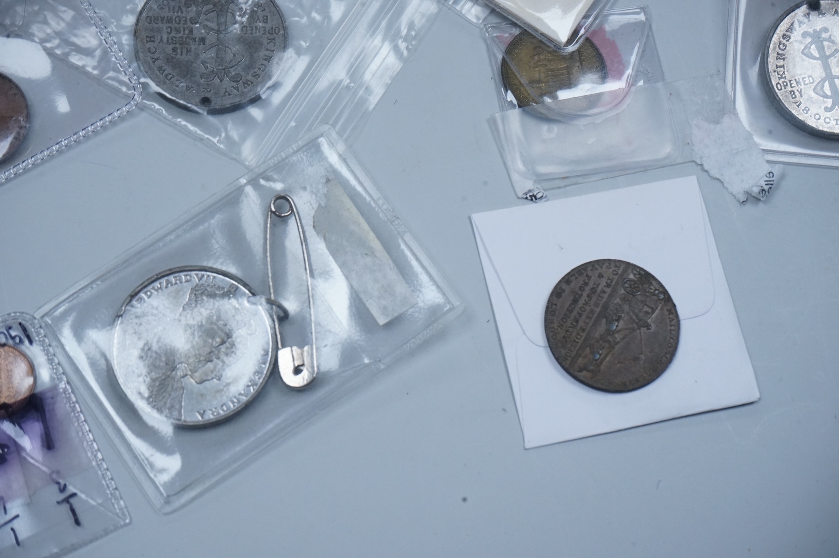 A QSA medal group miniature, comprising miniatures of; the Queen Victoria Golden Jubilee medal, the Queen’s South Africa medal with three clasps, the King’s South Africa medal with two clasps and the Africa General Servi